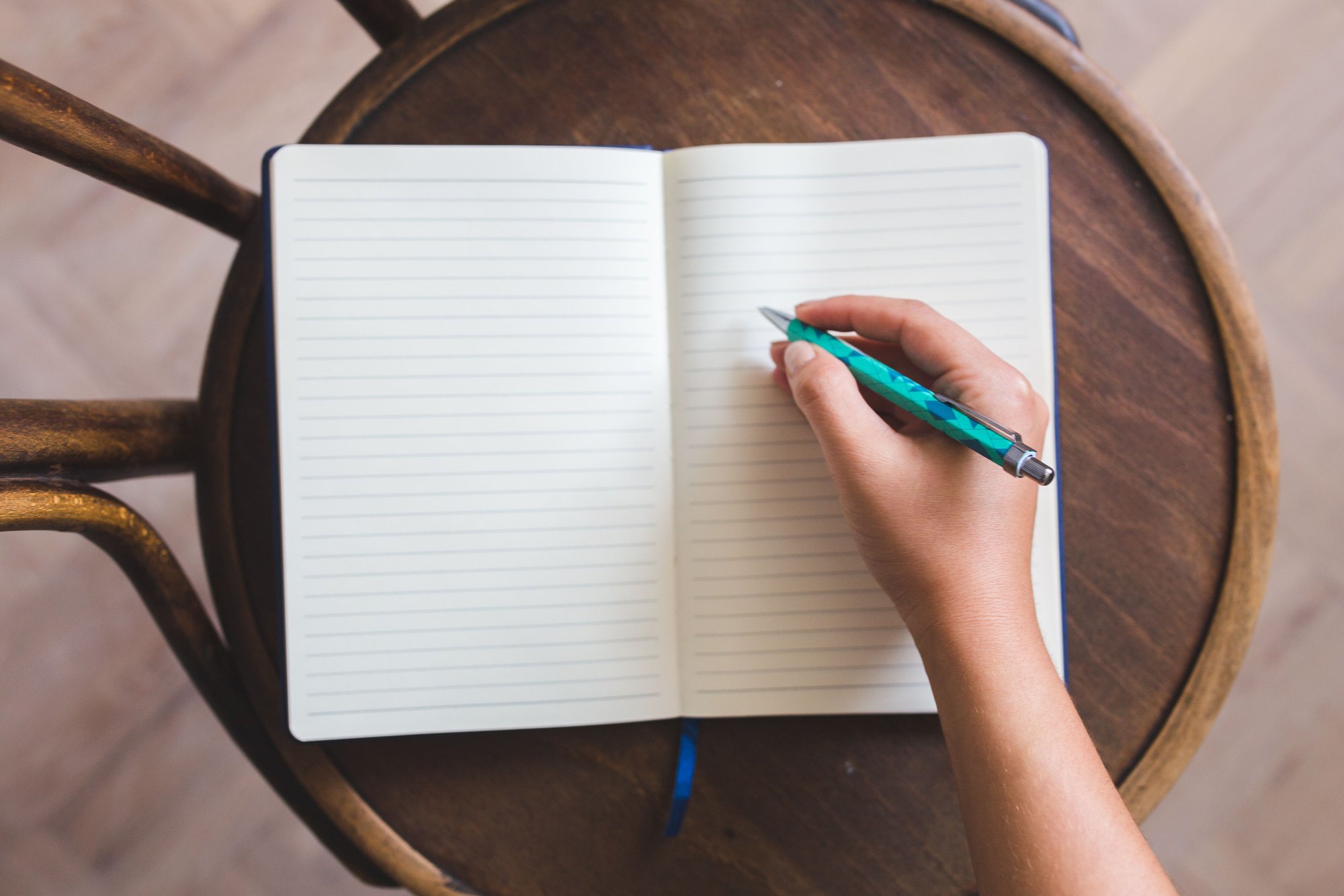 Notebook on table Notebook on table